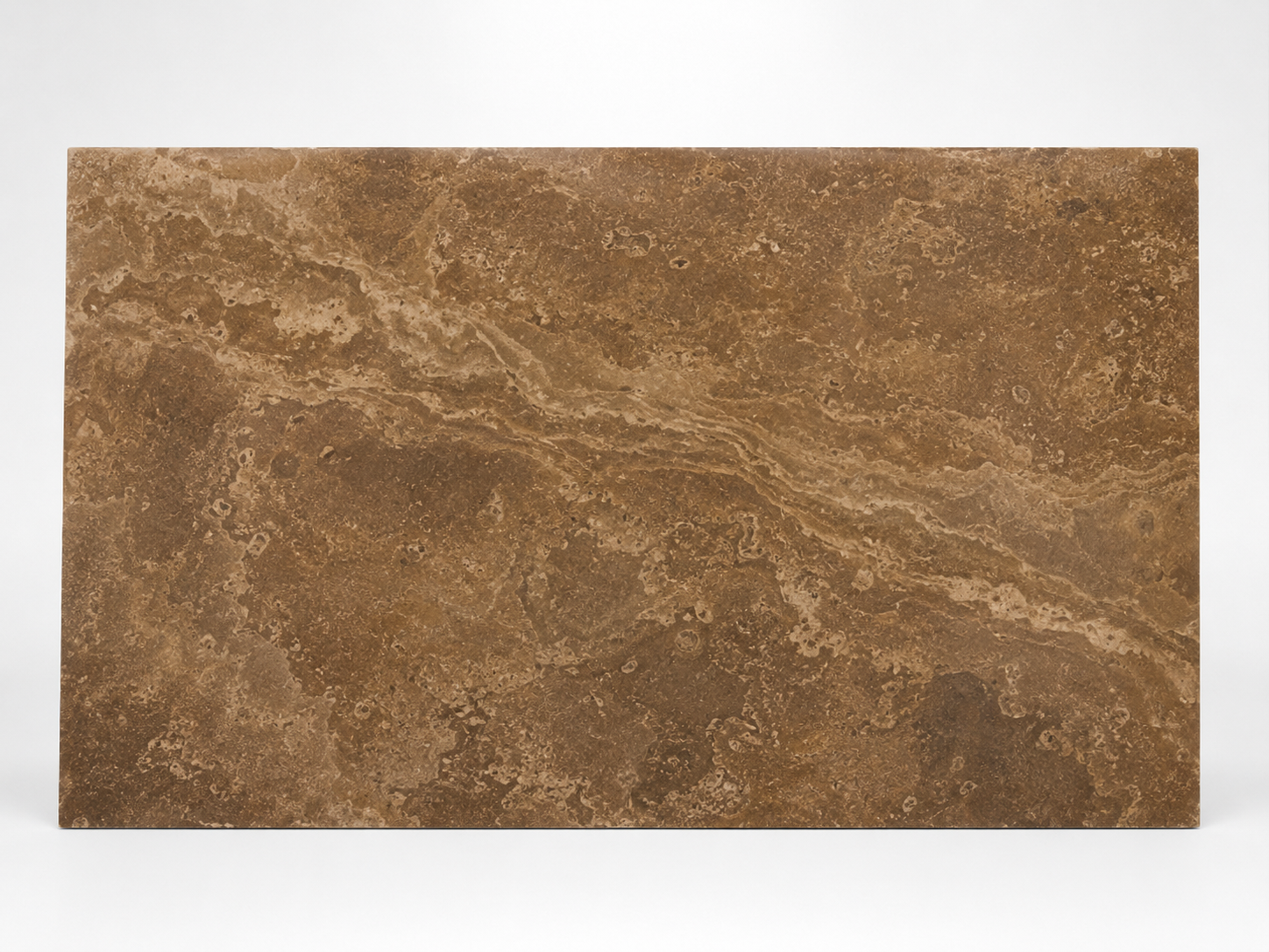 Full surface detail of Noche Travertine – Cross Cut · Walnut Brown