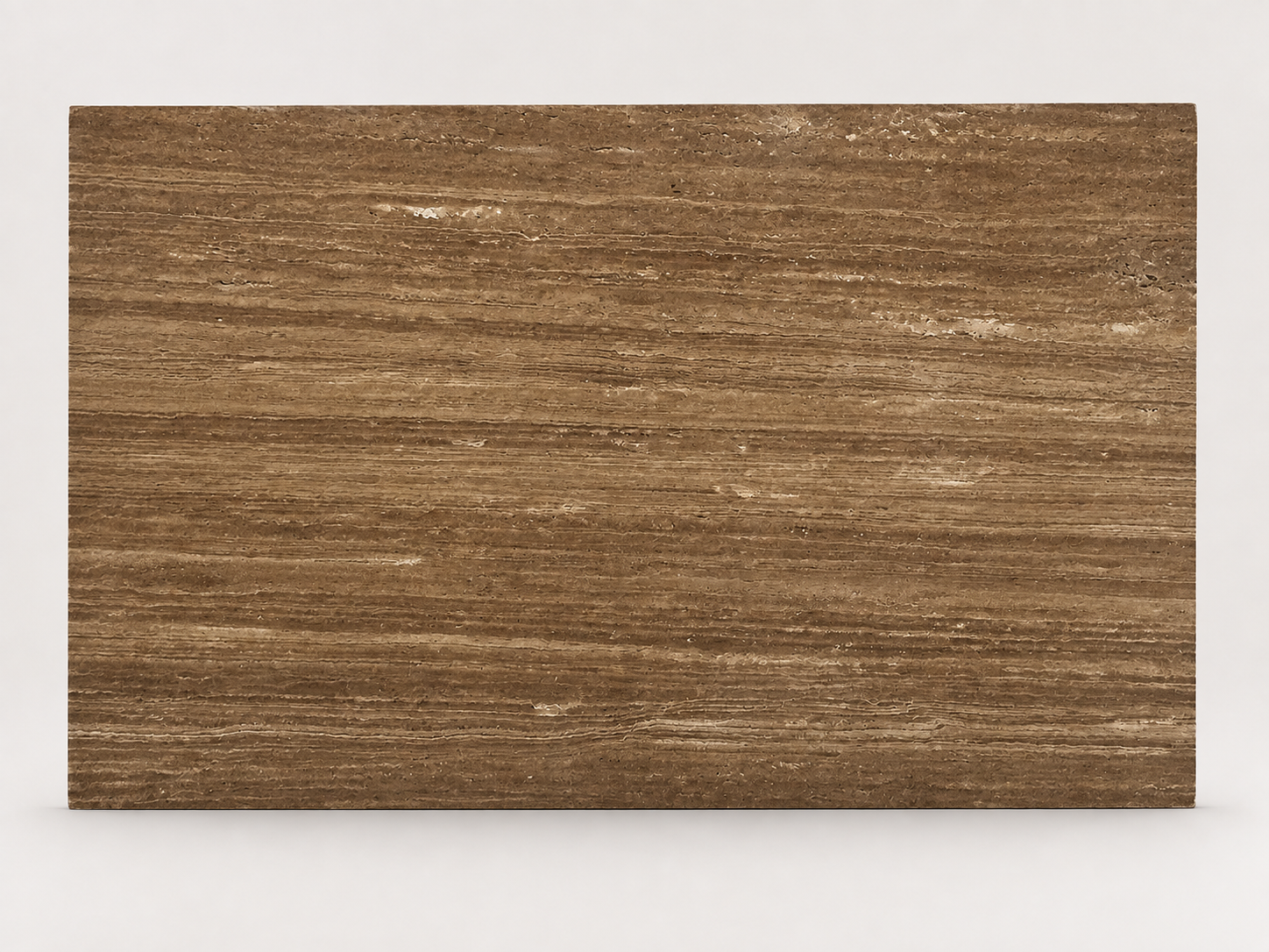 Full surface detail of Noche Travertine – Vein Cut · Walnut Brown